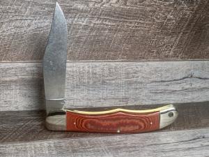 Schrade 125OT Mustang Folding Hunter with Red Linen Micarta Handles