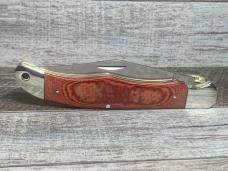 Schrade 125OT Mustang Folding Hunter with Red Linen Micarta Handles