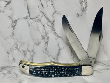 Schrade 25OT Folding Hunting Knife with Dyed, Jigged Bone Handles