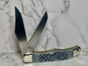 Schrade 25OT Folding Hunting Knife with Dyed, Jigged Bone Handles