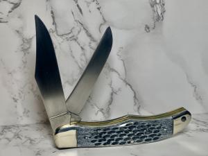 Schrade 25OT Folding Hunting Knife with Dyed Jigged Bone Handles