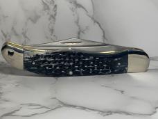 Schrade 25OT Folding Hunting Knife with Dyed, Jigged Bone Handles
