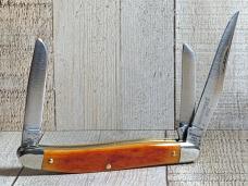 Schrade 61OT Slim Premium Knife with Smooth Amber Colored Bone Handles