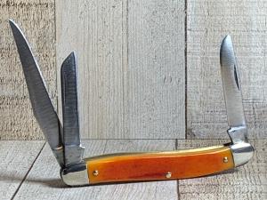 Schrade 61OT Slim Premium Knife with Smooth Amber Colored Bone Handles