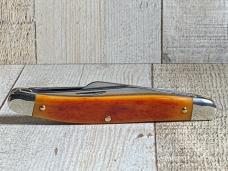 Schrade 61OT Slim Premium Knife with Smooth Amber Colored Bone Handles
