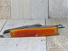 Schrade 61OT Slim Premium Knife with Smooth Amber Colored Bone Handles