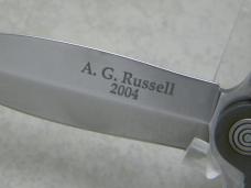 A.G. Russell 2004 Folding Sting Titanium Frame Lock Knife