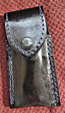 Damascus hand made hand forged folding knives. Blue with Engraved bolster. Ambidextrous. 