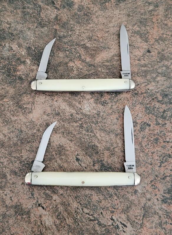A pair of 9261 Case XX, 7 dot,  Imitation pearl handles