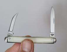 A pair of 9261 Case XX, 7 dot,  Imitation pearl handles