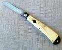  K'roo Slimline Wharnie"...4"...Black Linen bolsters&caps..Warthog Tusk Ivory Scales....Damasteel 