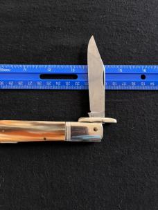 Ideal Products Inc Swing Guard Cheetah style Lockback Knife with Striped Scales