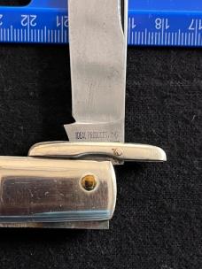 Ideal Products Inc Swing Guard Cheetah style Lockback Knife with Striped Scales