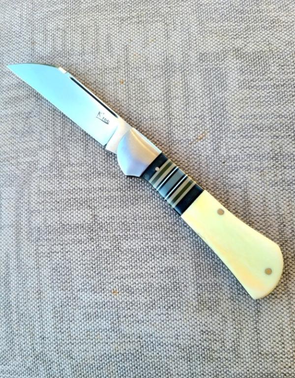 K'roo Warthog Tusk Striper Raven...Ivory Scales..Striper Bolsters..Rwl34...3.75 closed..coa and slip