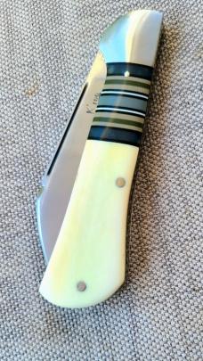 K'roo Warthog Tusk Striper Raven...Ivory Scales..Striper Bolsters..Rwl34...3.75 closed..coa and slip