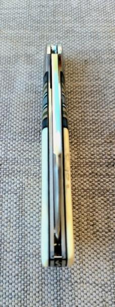 K'roo Warthog Tusk Striper Raven...Ivory Scales..Striper Bolsters..Rwl34...3.75 closed..coa and slip