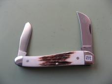   DANIELS FAMILY KNIFE BRANDS-TITUSVILLE CUTLERY-ROOSTER COMB OILED NATURAL ELK 1 OF 3