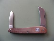   DANIELS FAMILY KNIFE BRANDS-TITUSVILLE CUTLERY-ROOSTER COMB MAMMOTH IVORY SHADOW PATTERN 1 OF 2