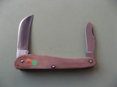   DANIELS FAMILY KNIFE BRANDS-TITUSVILLE CUTLERY-ROOSTER COMB MAMMOTH IVORY SHADOW PATTERN 1 OF 2