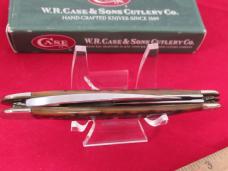Case XX 2002 Amber Bone Bobwire Scrolled Bolsters Seahorse Whittler Pattern # 6355 WH SS