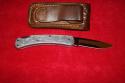 BUCK 110 FOLDING KNIFE WITH LEATHER SHEATH