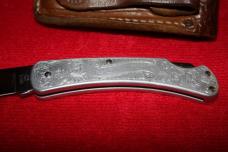BUCK 110 FOLDING KNIFE WITH LEATHER SHEATH
