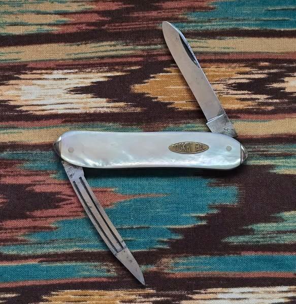 Vintage Robeson Shuredge MOP Lobster. Beautiful, fiery, Genuine Mother of Pearl handles.