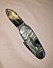 Vintage Fighting Rooster pocket knife. Green hues