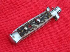 vintage 5-1/2"Oreste Dibon classic Stiletto Stag handles red dot swivel bolster 