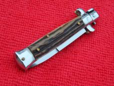 vintage 5-1/2"Oreste Dibon classic Stiletto Stag handles red dot swivel bolster 