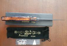 Piranha Toxin Burnt Orange on Black