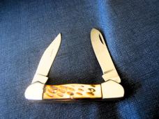 3-1/4" WHITE TAIL CUTLERY HAND MADE BONE CANOE UNUSED WITH SNAP