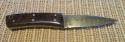 Early Jay Bigler fixed-blade knife with gold-toned Damascus blade 