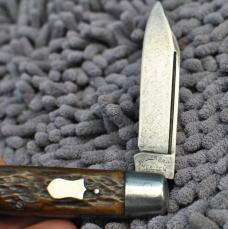 Miller Bros. Meriden CT Moose Pattern Equal End 4 1/4" Closed Jigged Bone Loud Snap Both Blades 