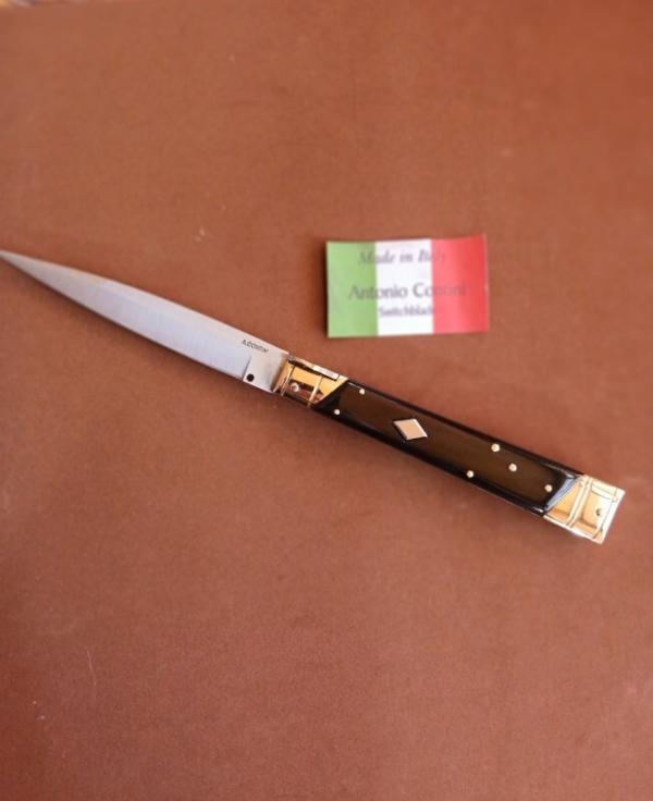 HAND PICKED SOLID BLACK BUFFALO HORN 13"ITALIAN PIC LOCK SWITCH BLADE BY ANTONIO CONTINI HAND PICKED SOLID BLACK BUFFALO HORN 13"ITALIAN PIC LOCK SWITCH BLADE BY ANTONIO CONTINI