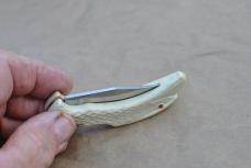 White Thermo Plastic Eagle head With Feathers Red Stone Eyes Lock Back 3 1/2" Closed Mint Taiwan