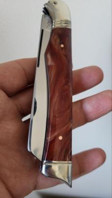5 1/8" Custom Handmade Trapper Knife with Bird's Head Bolster, Imitation Amber Handles, File work