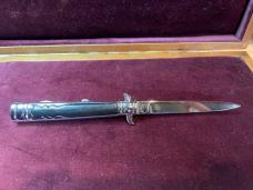 Vintage Hellraiser Spanish Stiletto automatic knife; black scales
