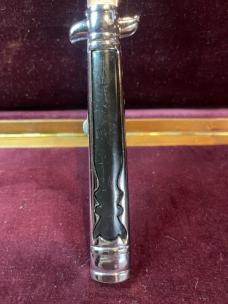 Vintage Hellraiser Spanish Stiletto automatic knife; black scales