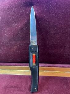 Vintage 1970s or 1980s Italian Flylock automatic knife with black plastic wraparound handle