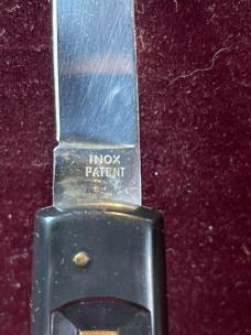 Vintage 1970s or 1980s Italian Flylock automatic knife with black plastic wraparound handle