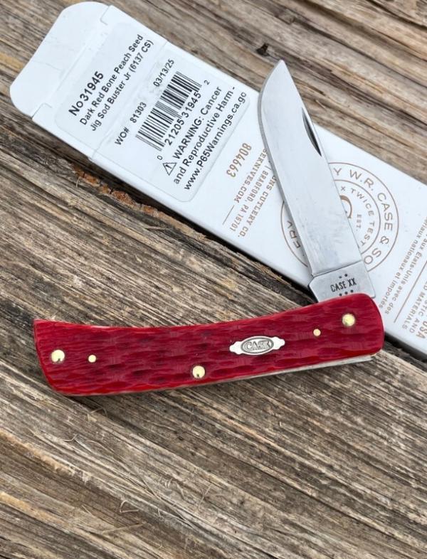 CASE XX ** 2025 DARK RED BONE CARBON STEEL PEACH SEED JIGGED SOD BUSTER JR