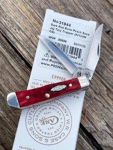 CASE XX ** 2025 DARK RED BONE CS PEACH SEED JIG TINY TRAPPER
