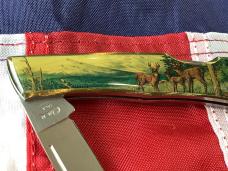 Case xx 1984 Medium Lockback (mdl# 059L SS) w/ Deer in wilderness theme Synthetic Handles -NOS