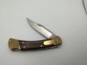 2000 Buck 110 Lock back Automatic Switchblade Engraved Bolsters Excellent 