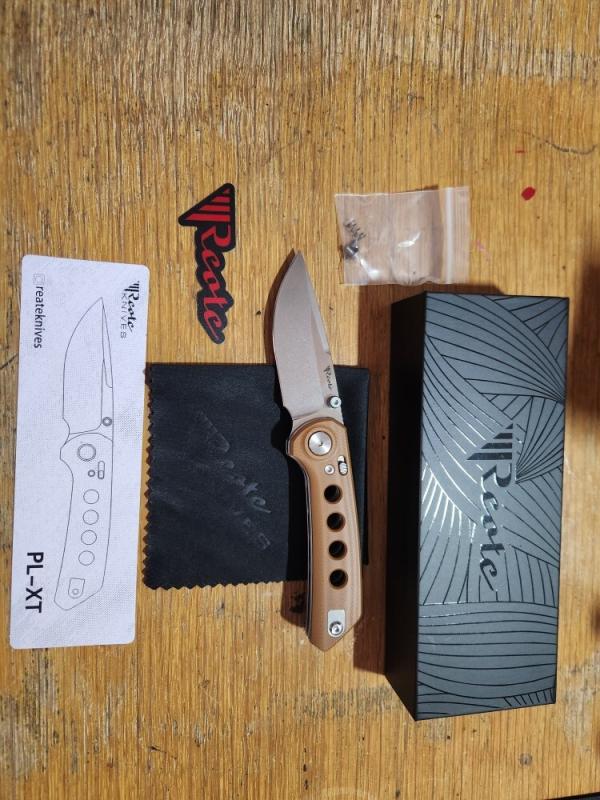 REATE PL-XT. Drop Point Blade. Tan G10 Handle. Quality crafted knife. Good weight very smoot