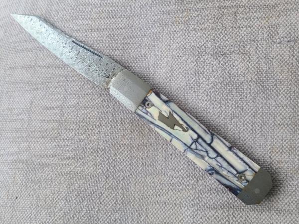 K'roo DragonFly Mammoth Ivory 4" clsd,Damasteel shield,blade,spring,bolsters,coa/slip