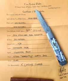 K'roo DragonFly Mammoth Ivory 4" clsd,Damasteel shield,blade,spring,bolsters,coa/slip