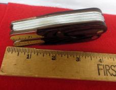 HUSKY MULTI-TOOL WOOD AND BRASS UNUSED FROM STORAGE IN KNIFE ROLL