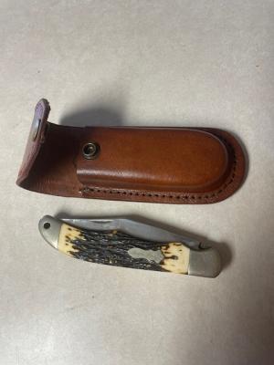 Vintage Schrade USA 127UH folding knife and leather sheath